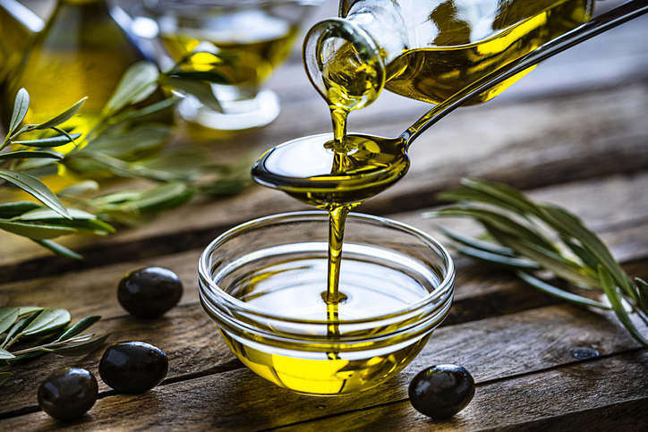 The oleic acid content in olive oil can range from about 55-95%