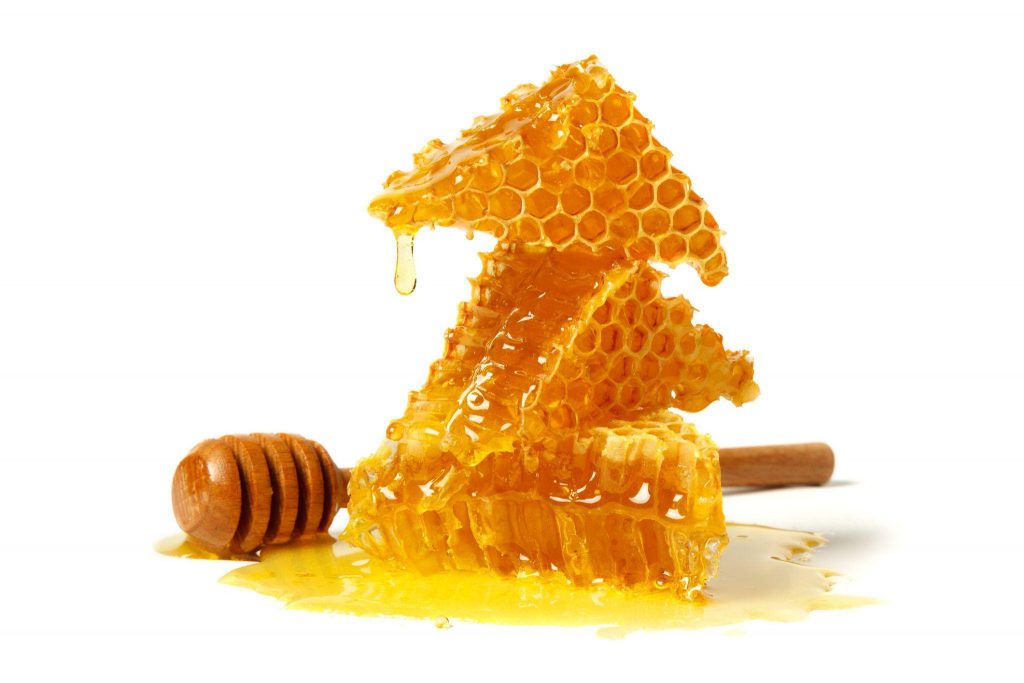 Sometimes honey is served with its honeycomb counterpart.